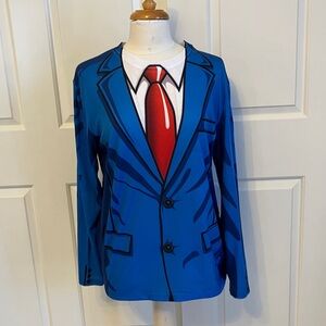Faux Real t-shirt with a blue cartoon suit and red tie graphic print.